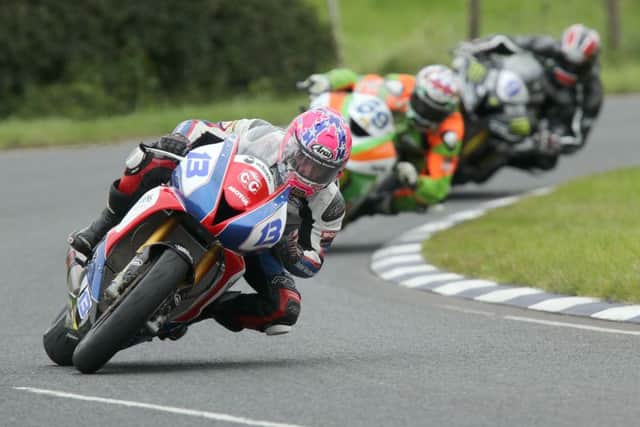 Lee Johnston (East Coast Construction Triumph) leads Glenn Irwin (Gearlink Kawasaki) and Ian Hutchinson (Team Traction Control Yamaha) at Quarry Bends during the second Supersport race at a previous Ulster Grand Prix.