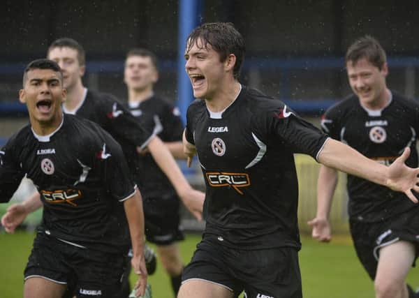 County Armaghs Lorcan Forde celebrates after scoring the opening goal against County Down