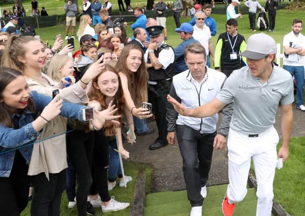 Young fans get pictures of Niall Horan arriving on the first tee at Galgorm