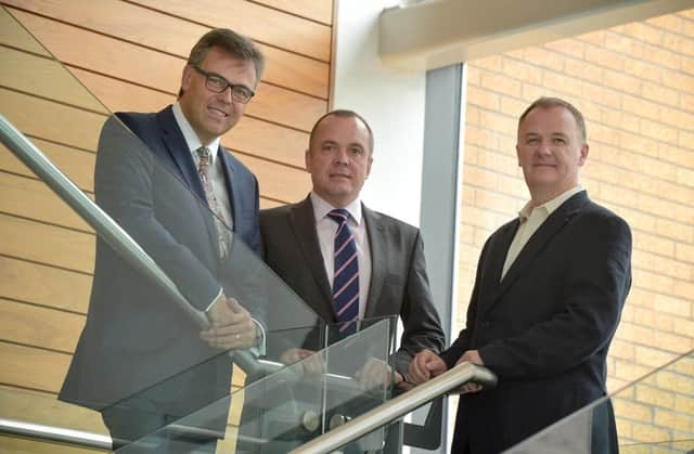 Invest NI chief executive Alastair Hamilton, left, pictured at the announcment with Crossvale managing director for Europe, Ian Purdy, centre, and company CEO Conor Brankin