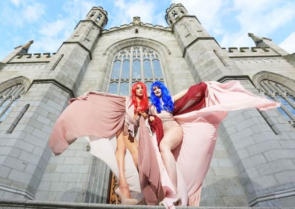 Ernesta Vegute from Warrenpoint and Rachel Hughes from Armagh pose outside the doors of Newry Roman Catholic Cathedral