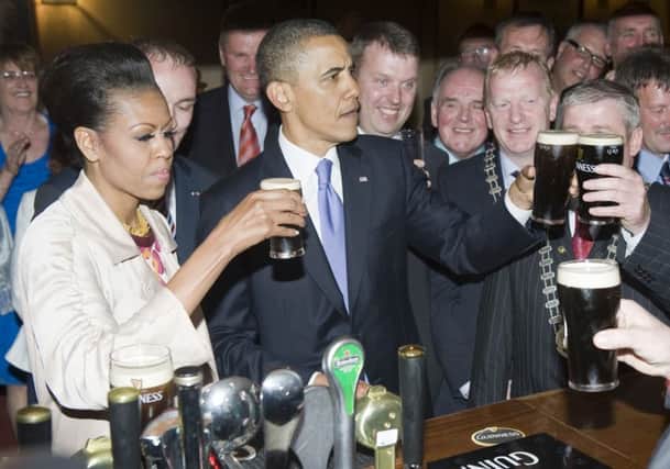 Cheers for the First Lady, Michelle and President Barack Obama during his visit to Moneygall, Co Offaly in 2011. Photo Kevin Byrne