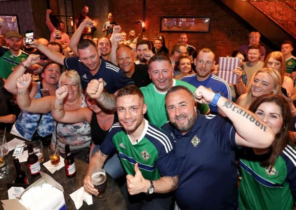 Carl Frampton meets the fans and buys them a round at Annie Moore's bar in Manhattan the day after winning the WBA featherweight belt  after defeating Leo Santa Cruz at the Barclays Centre, Brooklyn, NY.  Photo: William Cherry/PressEye