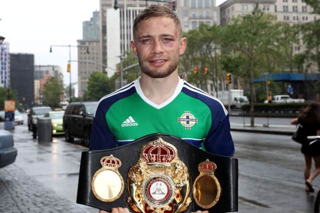 Carl Frampton with the WBA featherweight belt the morning after defeating Leo Santa Cruz in New York