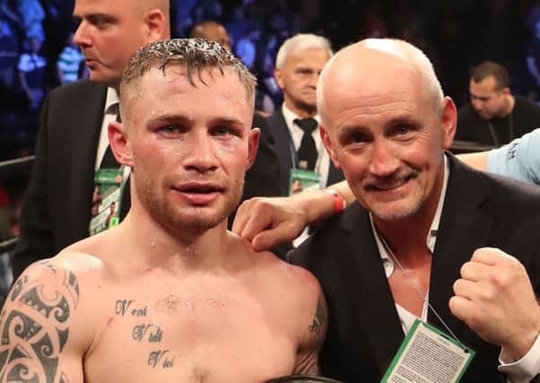 New world champion Carl Frampton with manager and mentor Barry McGuigan
