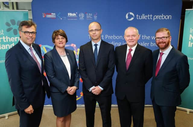First and Deputy First Ministers, Arlene Foster and Martin McGuinness with, from left, Invest NI chief executive Alastair Hamilton, Luke Barnett, Group CIO, Tullett Prebon and Economy Minister Simon Hamilton
