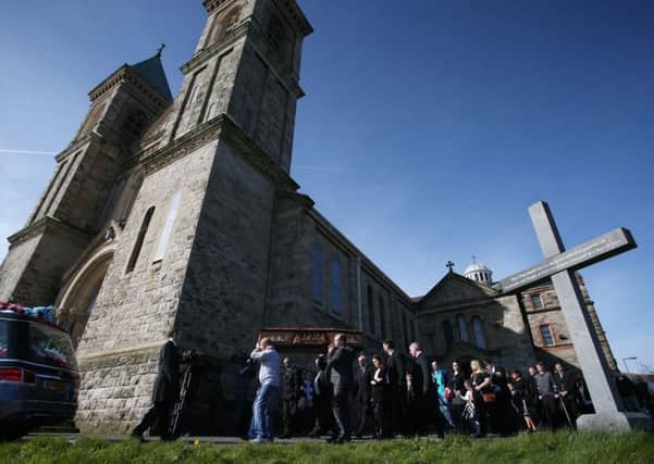 The funeral mass at Holy Cross in north Belfast of Michael McGibbon, who was murdered in the Ardoyne area of the city