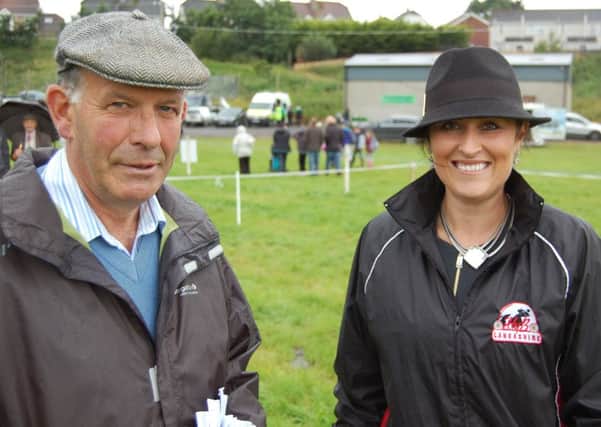 Dairy inter-breed judge Claire Swale enjoying a chat with steward Albert Foster at Fermanagh Show 2016