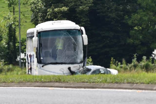 Pacemaker Press 4/8/2016
The scene after A woman in her 60s died in a collision between a car and a coach  on the A1 near Hillsborough on Friday morning. The road is closed in both directions at the junction between the Ballygowan Road and the Dromore Road.
Pic Colm Lenaghan/Pacemaker