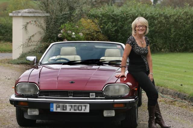 Wendy with one of her earlier Jags, an Jaguar XJS