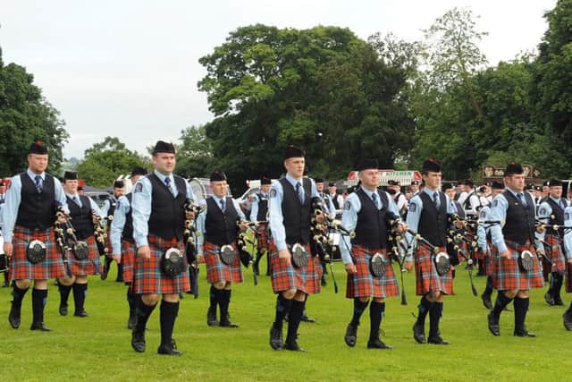 Pipe Major Emmett Conway (left in front row) and New Zealand Police Pipe Band pictured during the march past at the Lisburn & Castlereagh City Pipe Band Championships
