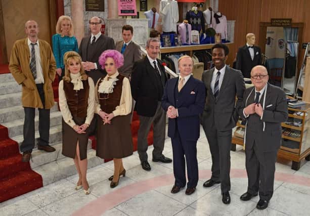 Embargoed to 0001 Monday August 8

For use in UK, Ireland or Benelux countries only 

Undated BBC handout photo of the new cast of Are you Being Served? 
(back left-right) Arthur Smith as Mr Harman, Jorgie Porter as Miss Croft,Justin Edwards as Mr Rumbold and Matthew Horne as Mr Grace,
(front left-right) Niky Wardley as Miss Brahms, Sherrie Hewson as Mrs Slocombe, John Challis as Captain Peacock, Jason Watkins as Mr Humphries, Kayode Ewumi as Mr Conway and Roy Barraclough as Mr Grainger. PRESS ASSOCIATION Photo. Issue date: Monday August 8, 2016. Grace Brothers is back and open for business as the sitcom returns after a 30-year hiatus. See PA story SHOWBIZ Sitcom. Photo credit should read: Kieron McCarron/BBC/PA Wire

NOTE TO EDITORS: Not for use more than 21 days after issue. You may use this picture without charge only for the purpose of publicising or reporting on current BBC programming, personnel or other BBC output or activity within 21 days of issue. Any use after that time MUST be cleared through BBC