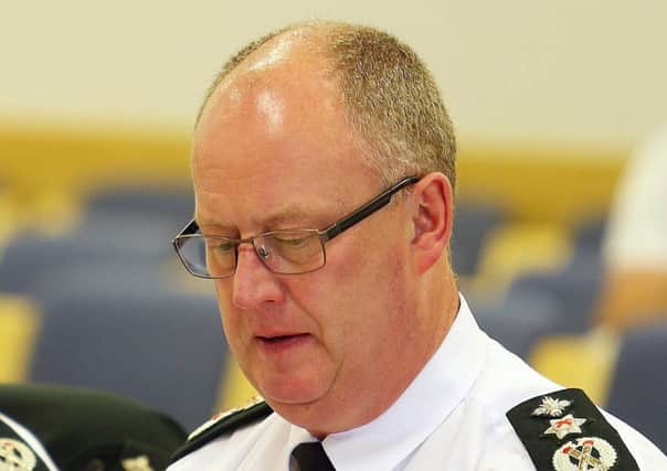 PSNI Chief Constable George Hamilton is facing defamation proceedings
