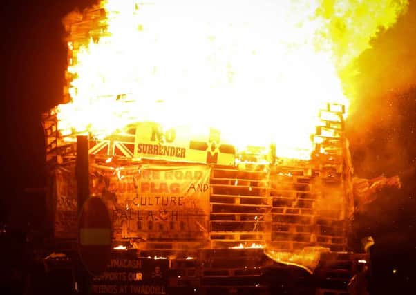 Unionist flags were set alight at the Divis internment bonfire