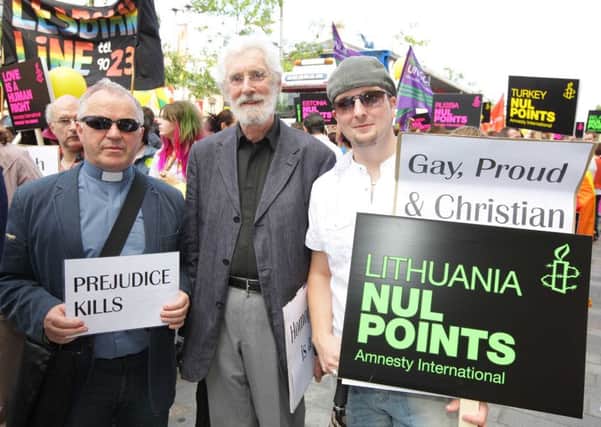 Rev Chris Hudson on a previous gay pride march in Belfast with other marchers. 
Picture by Kelvin Boyes / PressEye.com.