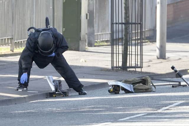 An 
Army technical expert at the scene of the suspect device at North Queen Street in Belfast