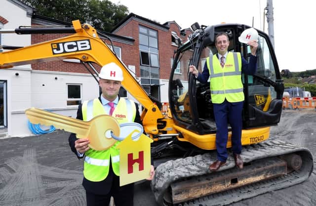 Communities Minister Paul Givan pictured with Helm Housing vice chairman Patrick McClughan