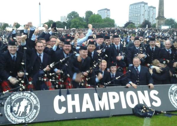 Field Marshal Montgomery Pipe Band celebrate their grade one world championship success