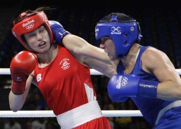 Finland's Mira Potkone (right) fights Ireland's Katie Taylor