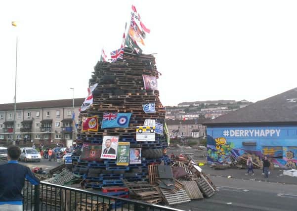 DUP MLA Gary Middelton's poster was among those placed on the bonfire last night.