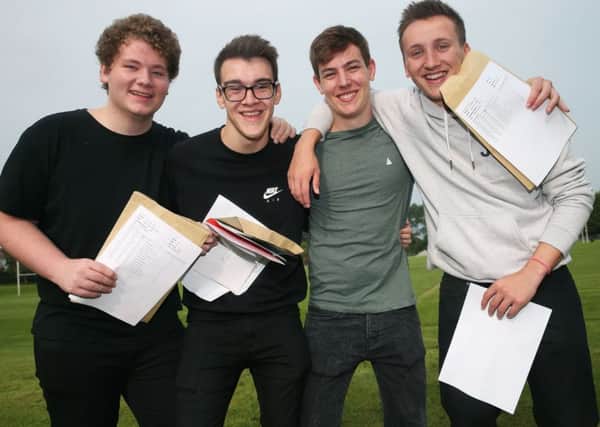 Students at Sullivan Upper School, Holywood, (from left) Danny Lyttle, Rory Caddy, Robin Watts and John Matchett, after receiving their A level results