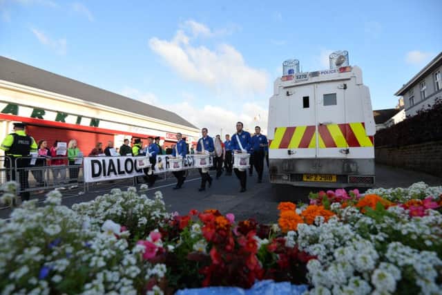 A parade hosted by  Ballymaconnelly Sons of Conquerors, passes threw Rasharkin Main Street earlier this month. Pic Colm Lenaghan/Pacemaker
