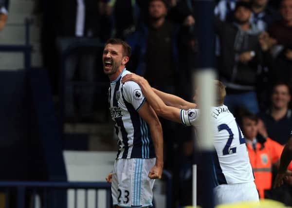 West Bromwich Albion's and Northern Ireland international Gareth McAuley celebrates after he scores