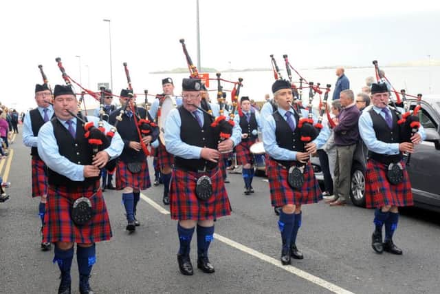 Gilnahirk Pipe Band on parade through Portrush before the start of the competitions