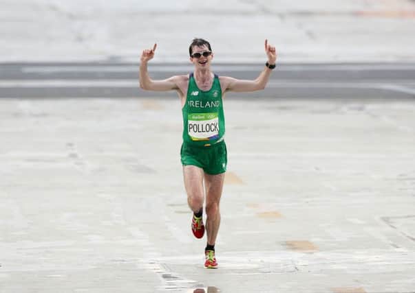 Ireland's Paul Pollock crosses the finish line in the Men's Marathon