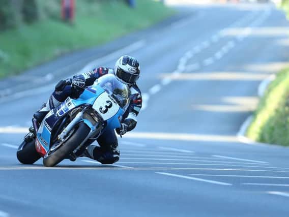 Michael Dunlop on the Team Classic Suzuki XR69 at the Classic TT during Monday evening practice on the Isle of Man.