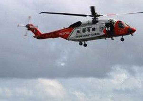 The Coast Guard helicopter.