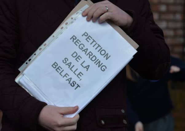 18/4/2016
Protesters at De La Salle School in West Belfast hand in a Petition. Parents and friends have continued  to protest at the way in which De la Salle College is being run
