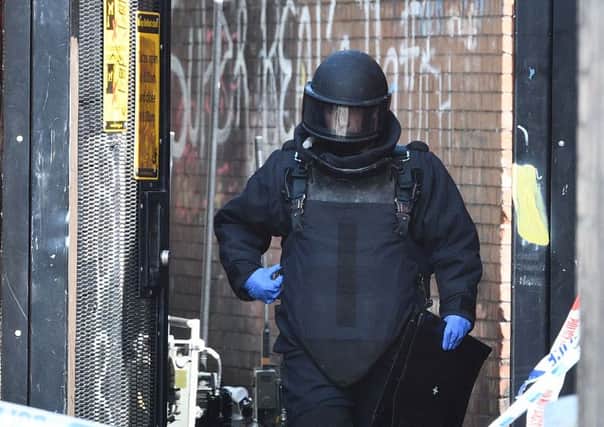 An Army Bomb Disposal expert at the scene of a security alert in the Beechmount Crescent Area of west Belfast