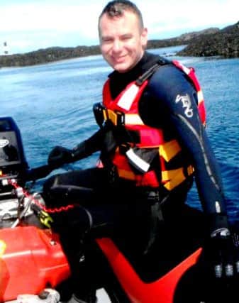 Ryan Gray, in 2016, on his own boat off the shore of the Copeland Islands