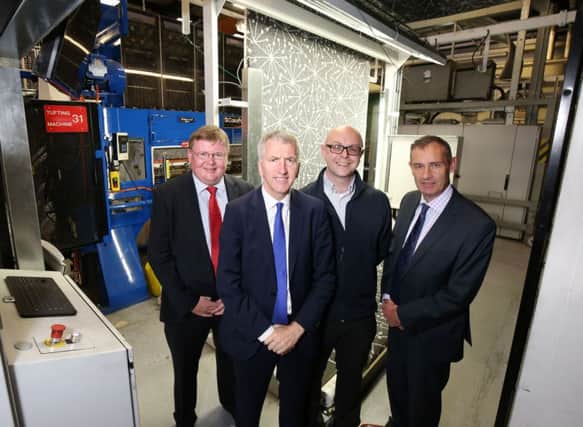 Mr Ã“ Muilleoir pictured with, from left, Andrew Greer of SSE Airtricity, Adrian Marks of Interface and Nick Coburn of the Northern Ireland Chamber