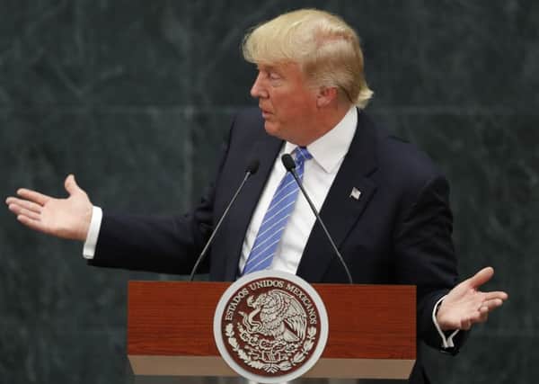 Republican presidential nominee Donald Trump speaks during a joint statement with Mexico's President Enrique Pena Nieto in Mexico City, on Wednesday. (AP Photo/Dario Lopez-Mills)