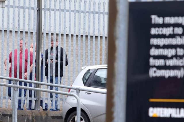 Workers leave the Caterpillar factory in Monkstown outside. Picture: Jonathan Porter/Press Eye