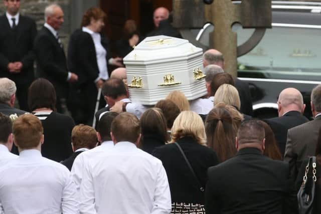 Coffins are taken into Saint Mary's Church in Castlerahan, Co Cavan. Brian Lawless/PA Wire