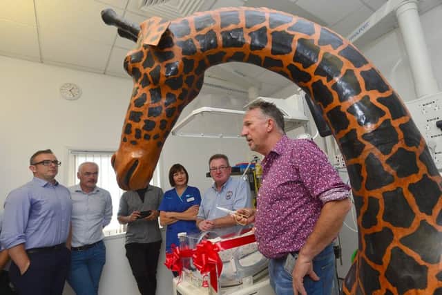 Sir Ian Botham officially opens the specialist Giraffe Omnibed  at the Royal Belfast Hospital for Sick Children