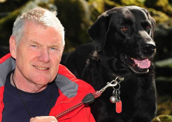 Researcher Neil Powell pictured with his dog Charco