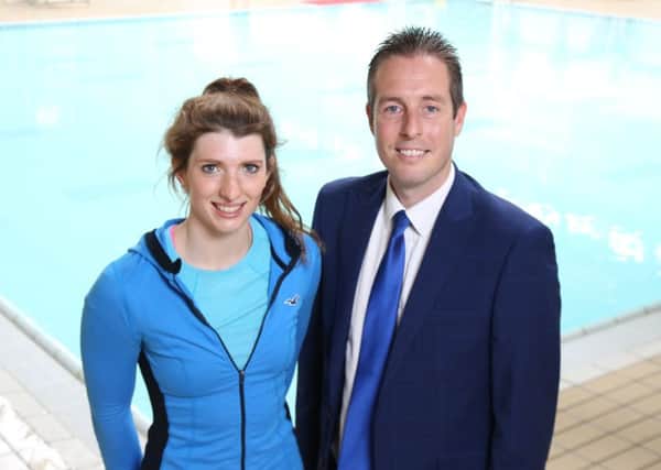 Sports Minister Paul Givan with swimmer Bethany Firth