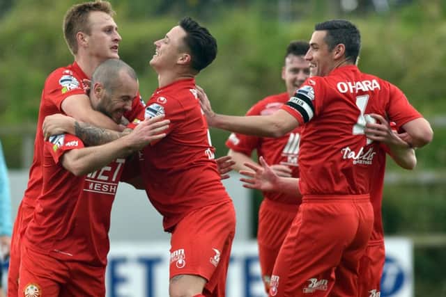 Stephen Hughes and his Portadown team-mates celebrate kicking off the weekends scoring. Pic by PressEye Ltd.