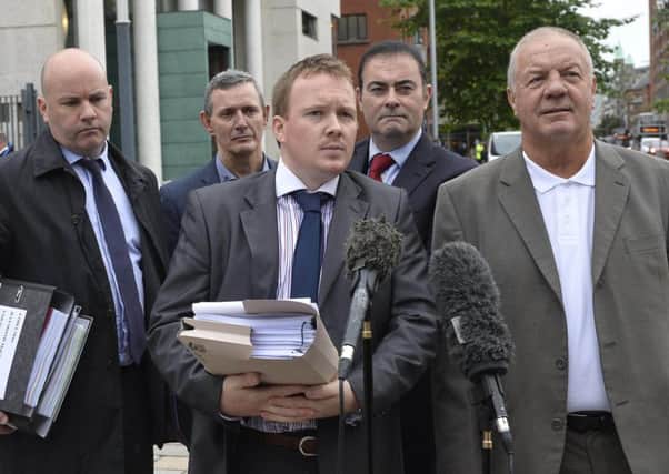 Raymomd McCord pictured with Ciaran OHare from McIvor Farrell soilicitors  at Belfast High Court ahead of a legal challenge by the Victims group over Brexit. Photograph by Stephen Hamilton /Presseye