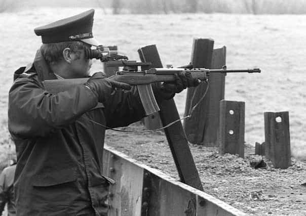 RUC officer with rifle in the border area, 1983
