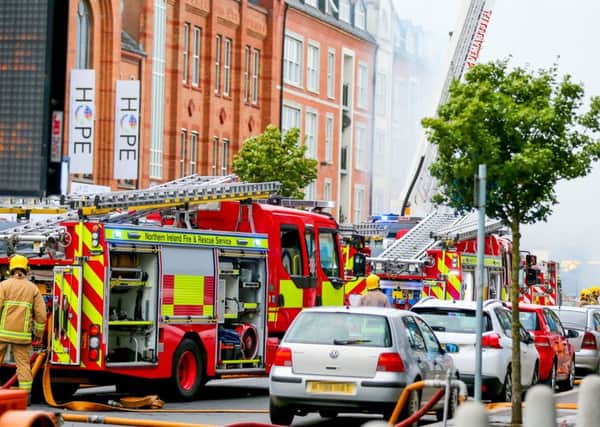 Picture - Kevin Scott / Presseye 

Firefighters deal with a major fire in the Great Victoria Street area of Belfast on the 11th September 2016 ( Photo by Kevin Scott / Presseye )