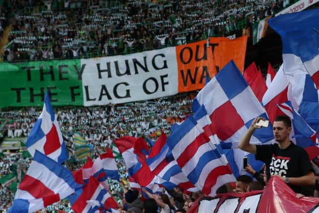 Celtic and Rangers fans show their support during the Ladbrokes Scottish Premiership match at Celtic Park, Glasgow