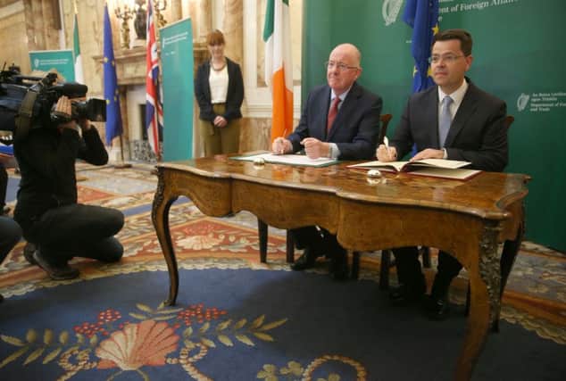 Foreign Affairs Minister Charlie Flanagan meeting Northern Ireland Secretary James Brokenshire at Iveagh Hose in Dublin where they held talks on Brexit and signed an international treaty between the Irish and British Governments to establish the Independent Reporting Commission. PRESS ASSOCIATION Photo. Picture date: Tuesday September 13, 2016.  Photo credit should read: Brian Lawless/PA Wire