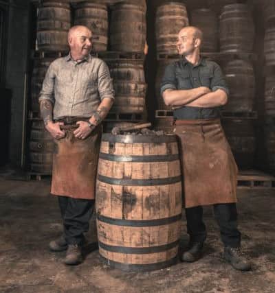 Father and son, Alastair and Chris work side-by-side in the cooperage. INBM 39-703-CON
