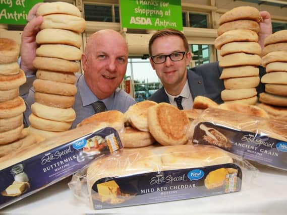 Asda regional buying manager Brian Conway with Chris Moore of Irwins