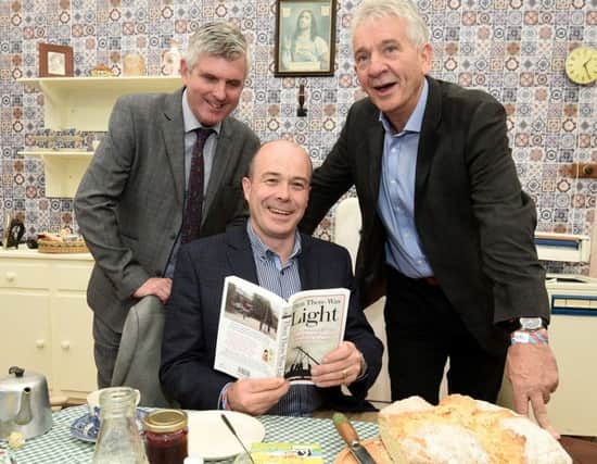 Pictured at the launch of 'Then there was light', a unique collection of stories on Ireland's Rural Electrification, are P C Lynch, Head of High Voltage and Contracting at ESB Networks, the Irish Minister for Communications, Climate Action and Environment Denis Naughten TD and P J Cunningham, co-editor